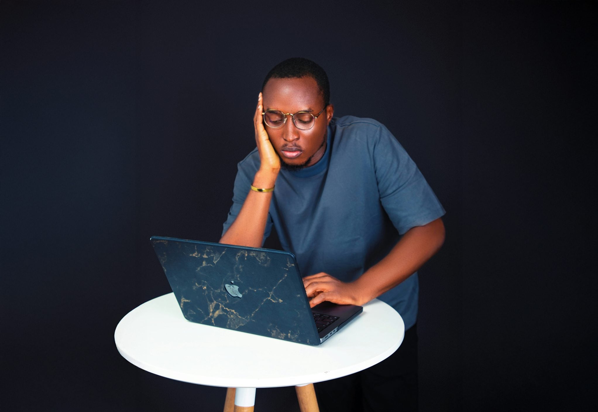 Person looking confused at a laptop